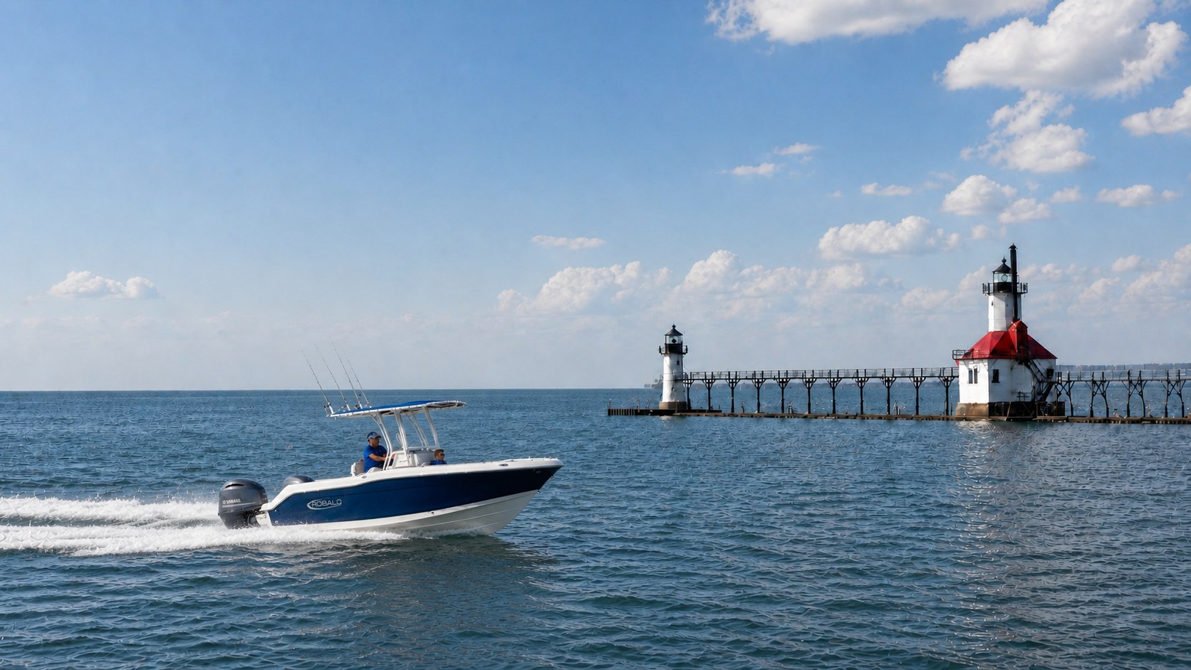 Blue-hull Robalo center console underway near the St. Joseph North Pier lighthouses
